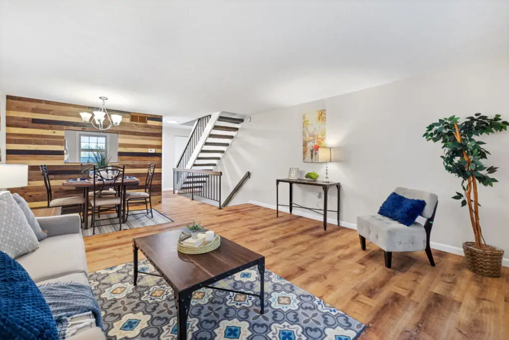 Living room with updated finishes after property restoration